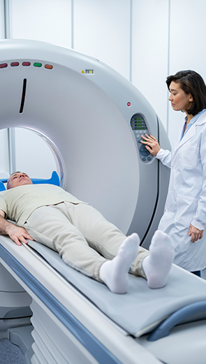 Patient undergoing private MRI scan with specialist at Surrey clinic