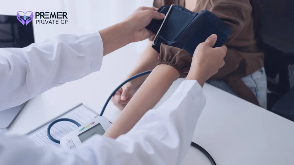 GP checking blood pressure to assess stress impact
